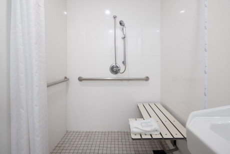 Welcome To Our Newly Renovated Hotel - Accessible shower with seat